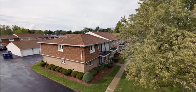 Aerial panorama over an apartment building and its grounds